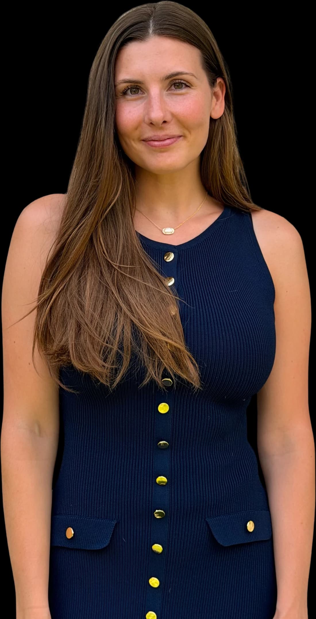 Annie Mewborn in a navy dress, smiling.